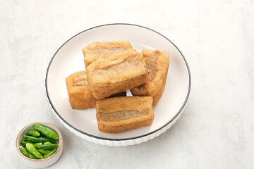 Tahu Bakso, made from tofu filled with meatball dough, served with chili. Indonesian traditional food 
