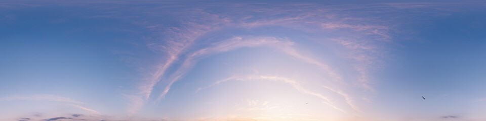 Sunset sky panorama with bright glowing pink Cirrus clouds. HDR 360 seamless spherical panorama. Full zenith or sky dome for 3D visualization, sky replacement for aerial drone panoramas.