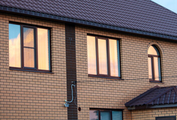 House on the background of the sunset