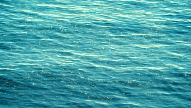 Blue clear sea water surface. Nature background