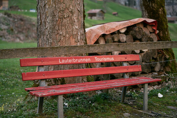 Naklejka premium empty bench in the Swiss Alps mountains.