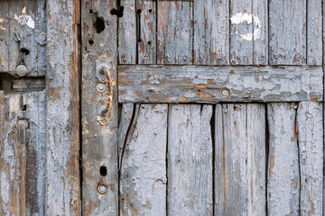 Old wooden door with cracked paint
