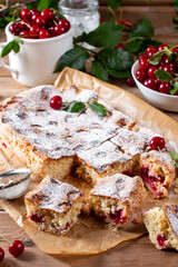 Fresh sponge cake with cherries. Chiffon biscuit. Homemade bakery concept