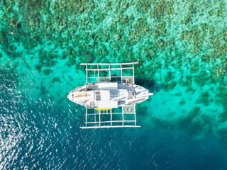 Aerial view of a boat in the islands of Palawan
