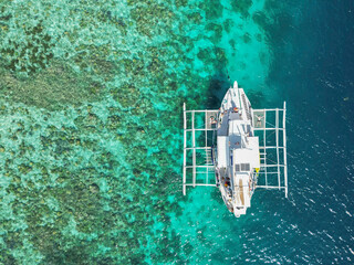 Aerial view of a boat in the islands of Palawan