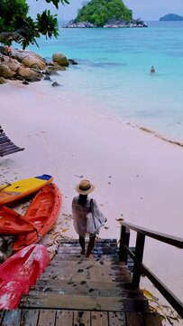 Asian women on the beach of Koh Lipe Thailand, Thai woman walking on the beach