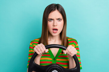Portrait of aggressive furious driver lady wear stylish clothes impressed accident negative situation isolated on cyan color background