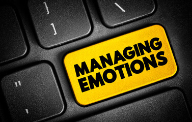 Fototapeta premium Managing Emotions text button on keyboard, concept background