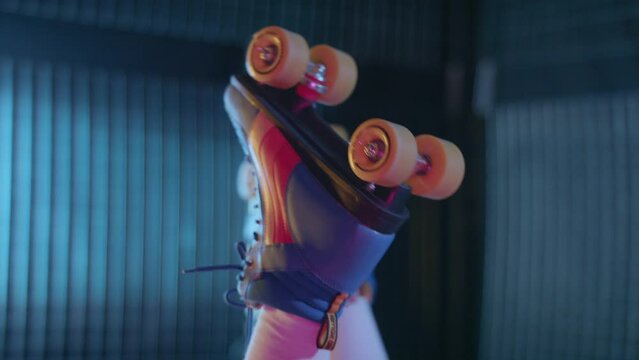 Roller skates retro woman training in studio