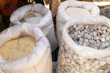 Sacks of figs and cornmeal at a street oriental bazaar