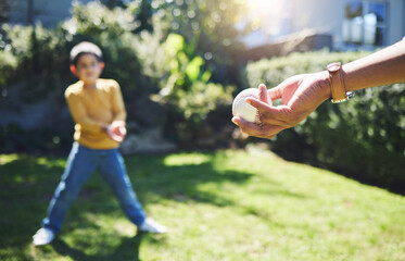 Hand, baseball and person playing with child on bokeh or .parent and kid on grass field for...