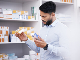Pharmacy, medicine and man with pills reading label for medication, prescription and treatment. Healthcare clinic, drug store and male person with box for medical product, supplements and antibiotics