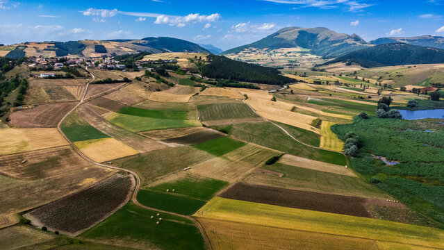 Colfiorito, Umbria. Fields and crops. Play of colors seen from above.