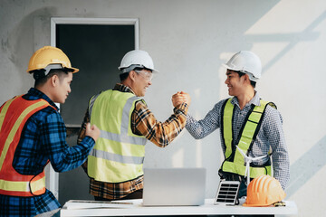 Team architects workers,  join hands to join forces to join forces to work for success. Teamwork...