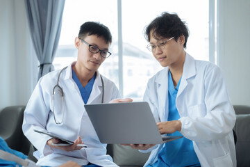 Medicine, healthcare and people concept - male doctor with stethoscope and clipboard at clinic