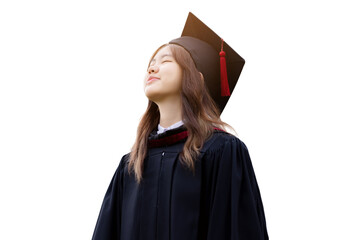 College degree graduations. Happy young Asian girl in gown with mortarboard isolated on white...