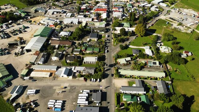 Takaka small town flyover aerial view in New Zealand, Golden Bay, day