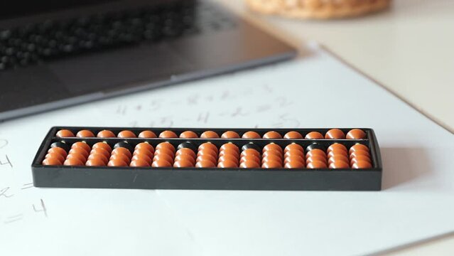 abacus for mental arithmetic on a table , nobody. The concept of learning mathematics for children, Russian mathematics
