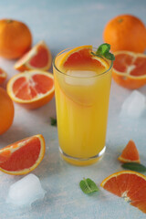 Red oranges juice with mint and ice