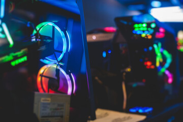 Naklejka premium View of Gaming PC with rgb led lights, powerful high end personal computer, assembled with hardware components, at home or in cybersport arena