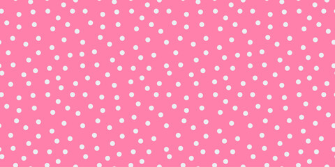 Small polka dot seamless pattern background. random dots texture. pink and white dots textile