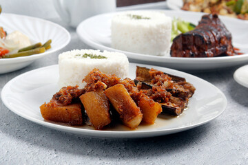 Freshly cooked Filipino food called Pork binagoongan