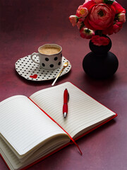 Notebook pen and coffee