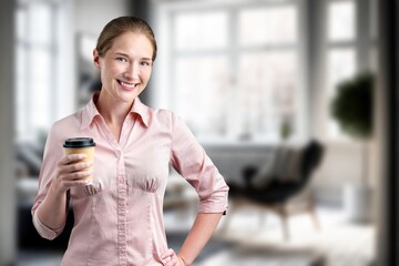 Beautiful young woman drink coffee on her kitchen