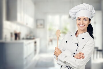 Happy young chef baker posing