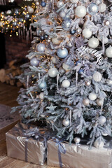 Christmas tree with silver and blue decorations