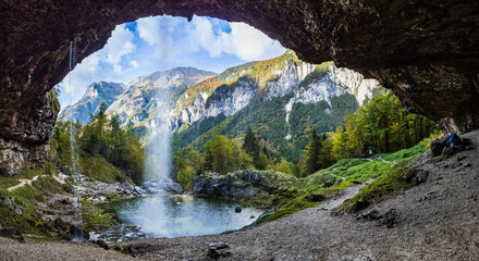 Autumn on the Karst waterfall of Fontanon di Goriuda. View from above. - 597105835