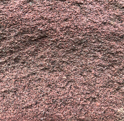 Rough red stone background 