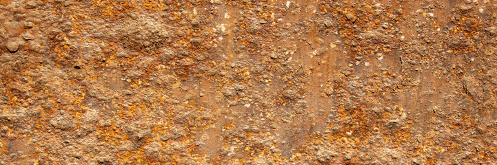 Rust of metals.Corrosive Rust on old iron with a hole. Rusted orange painted metal wall.