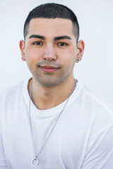 Obraz premium Close up portrait of a young beautiful brunette guy