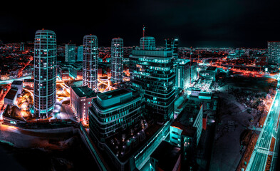 Fototapeta premium Bratislava city downtown skyline at night, illuminated modern high-rising buildings and traditional houses in Slovakia