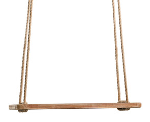 Classic wooden swing on the rope for playing