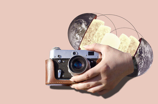 Digital collage with female hand holding vintage film camera and divided Earth palnet