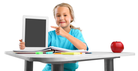 Child self doing homework at the home with a digital tablet