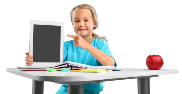 Child self doing homework at the home with a digital tablet