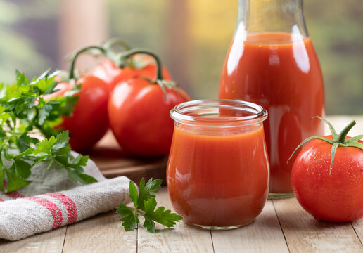 Tomato juice with fresh tomatoes and parsley