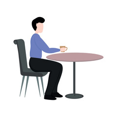 Fototapeta premium A man sits at a table and drinks coffee. A man sits and drinks a hot drink. A man sits in a cafe or restaurant and drinks coffee