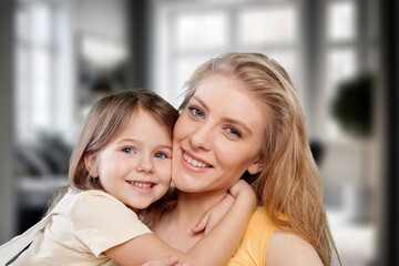 Loving young happy mother hold cute child