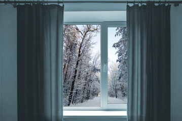 Window in a room overlooking the winter landscape