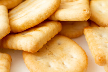  Cracker biscuits of various shapes close-up.