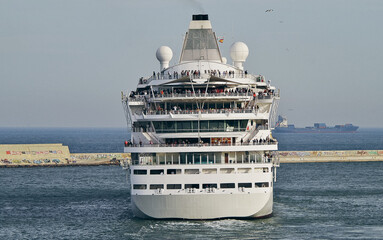 Modern luxury club cruiseship cruise ship liner Cara or Aura in port and sailing for dream holiday...