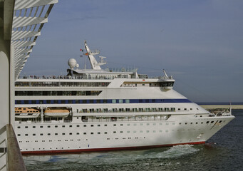 Modern luxury club cruiseship cruise ship liner Cara or Aura in port and sailing for dream holiday...