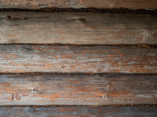 Fototapeta premium Wood texture on the wall of a wooden log house, close-up, wooden buildings on Kizhi Island, Karelia, northern Russia.