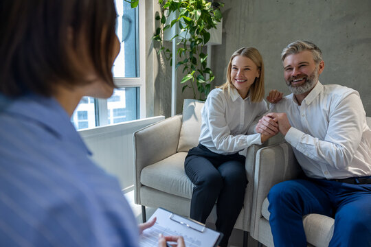 Couple Discussing Marriage Agreement Conditions With The Notary