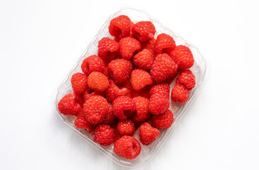 close up fresh raspberries on white background