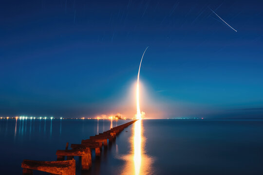 Rocket launch liftoff close up on launchpad. Falcon 9, Spacex rocket going to space, moon or Mars. Night view, long exposure. Generative AI.